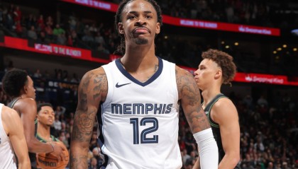  莫兰特禁赛归来率队击败开拓者  